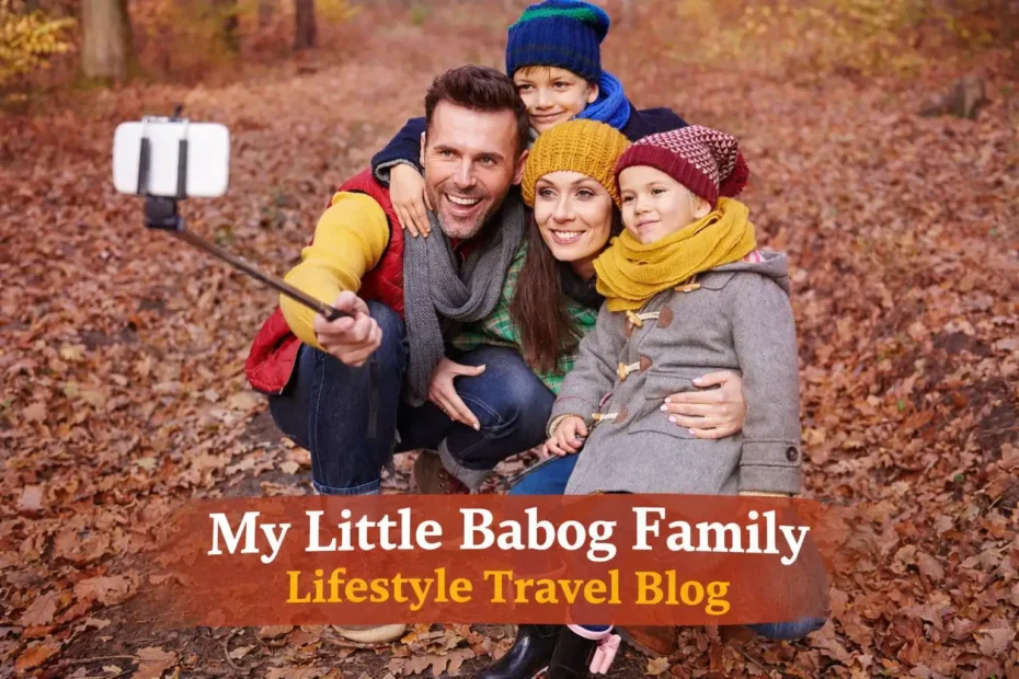 Happy family taking a selfie in an autumn forest with “My Little Babog Family Lifestyle Travel Blog” text overlay.